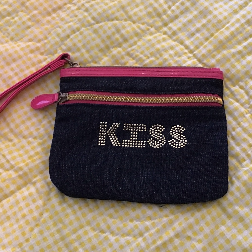 Modella KISS denim wristlet with metallic embellishment